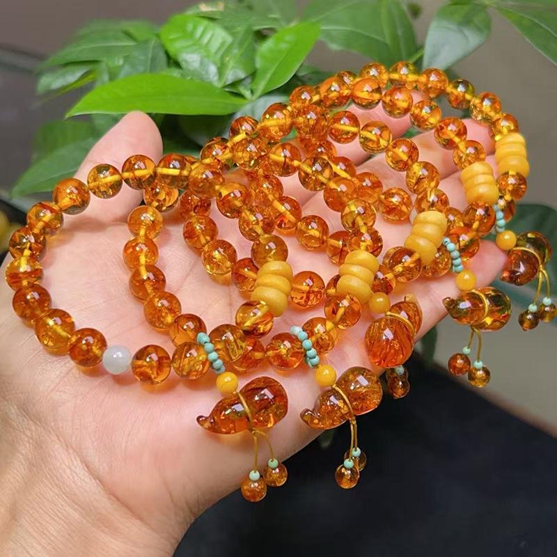 Bracelet unisexe en perles d'ambre ethnique: Design Floral, Perles Rondes en Cire d'Abeille