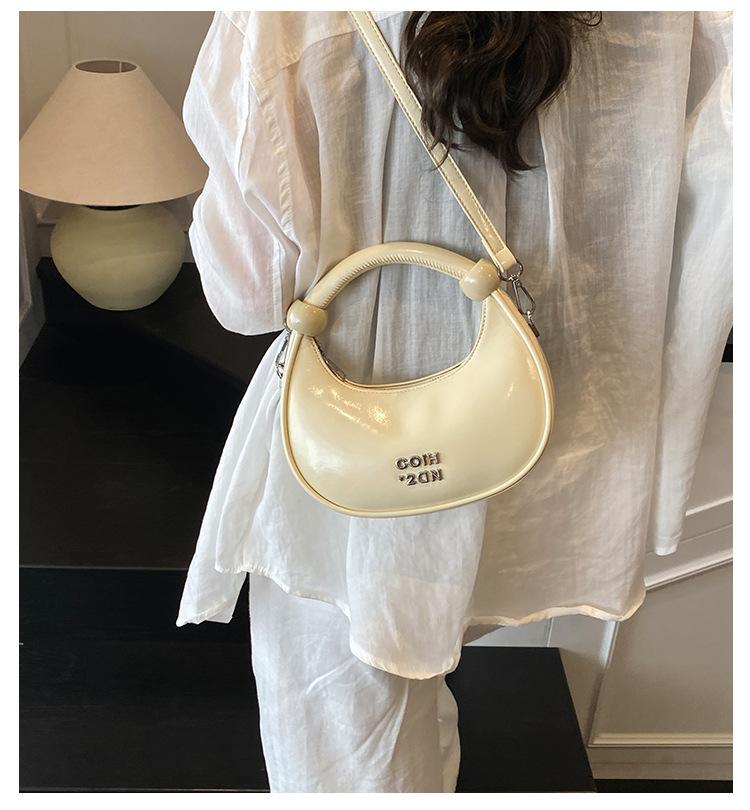 Super fire niche dumpling bag 2025 new spring and summer versatile shoulder messenger bag exquisite mini portable small bag