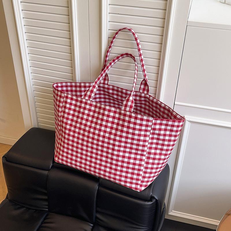 Oggi, le borse tote in tela a quadri di grande capacità sono popolari, borse a tracolla per lo shopping in stile letterario e pigro per la moda estiva.