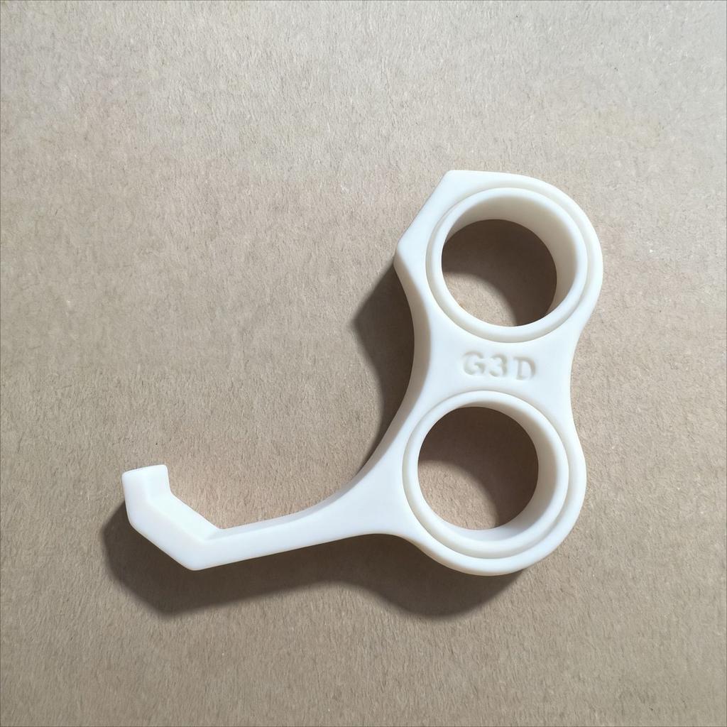 Multi-functional Ergonomic Phone Grip Stand And Stress-relief Toy Integrated Holder.