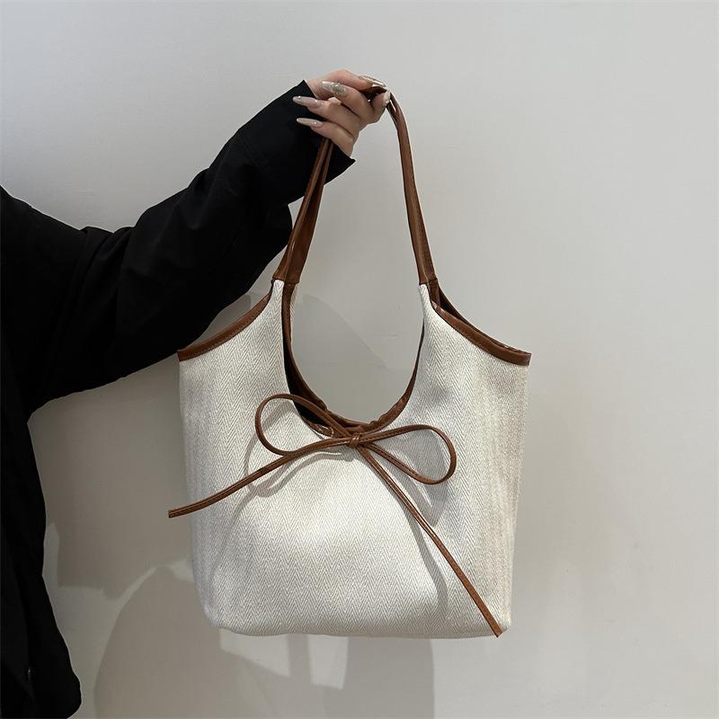 Casual commuting large-capacity striped cotton and linen bag women's new versatile shoulder bag portable tote bag