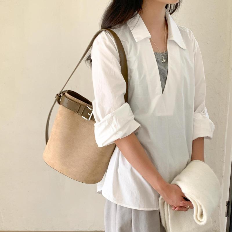 Autumn and winter new suede bag retro cylinder bucket bag women's niche leather buckle portable shoulder bag