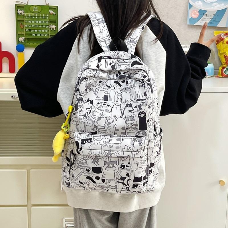 New high-value niche personalized graffiti comics trendy cool backpacks for men and women lightweight large-capacity backpacks