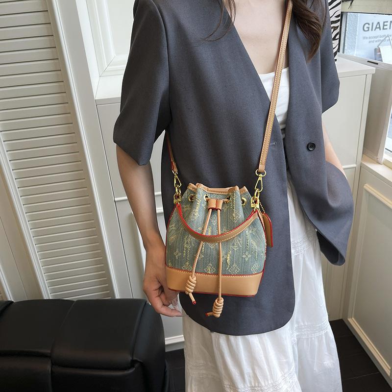 New versatile retro bucket bag New women's bag Fashion and high-end portable shoulder bag Crossbody bag