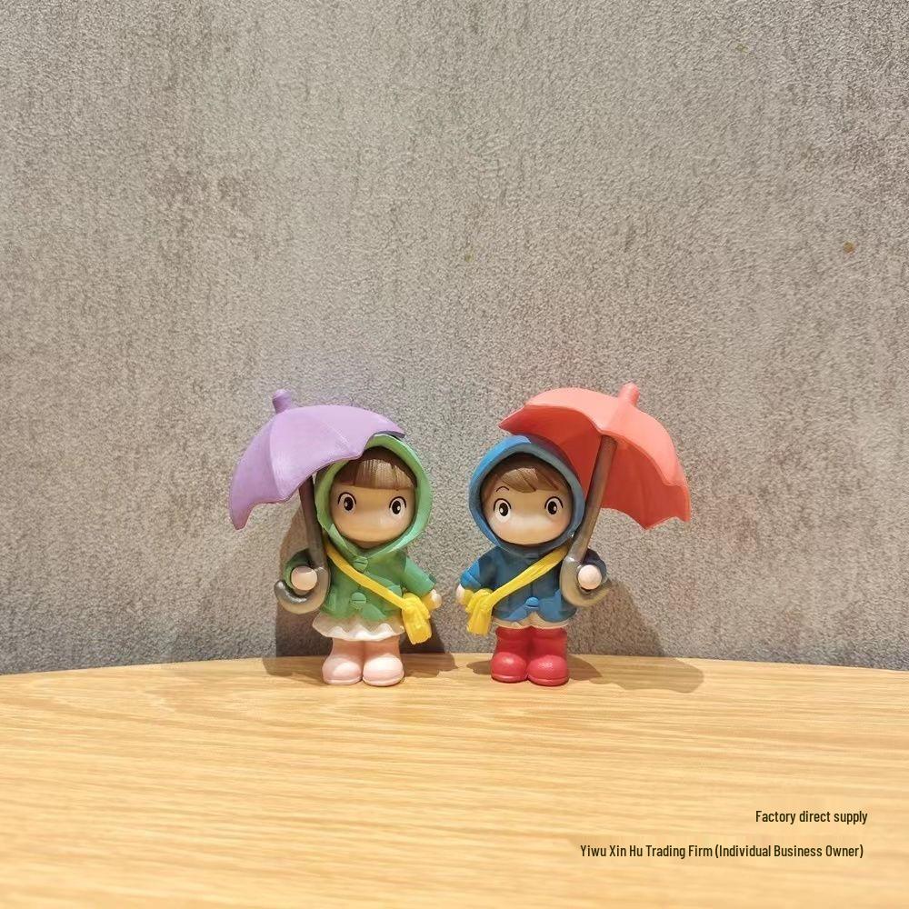 Cartoon Character Desk Ornament: Cute Umbrella-Holding Figure for Creative Office Decor