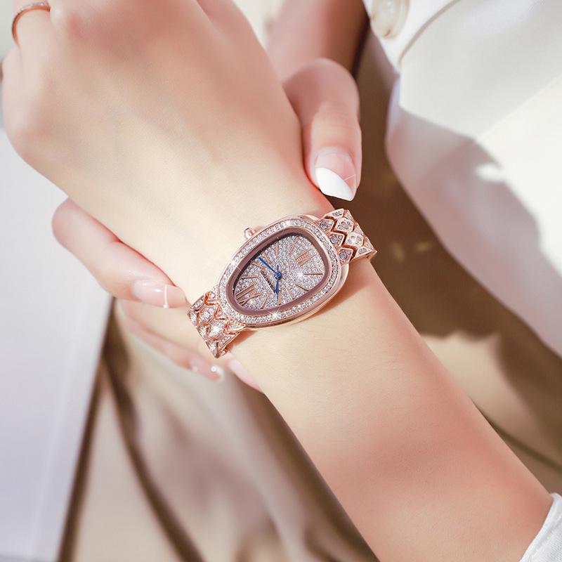 Elegante sternförmige Damen-Quarzuhr in Schlangenform - Luxuriöses wasserdichtes mit Diamanten besetztes Armband von Light Fashion Niche.