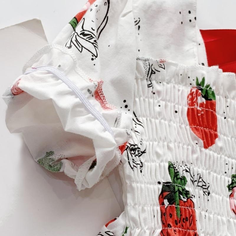 Dziewczęca sukienka z kokardą na plecach w kolorze truskawkowym