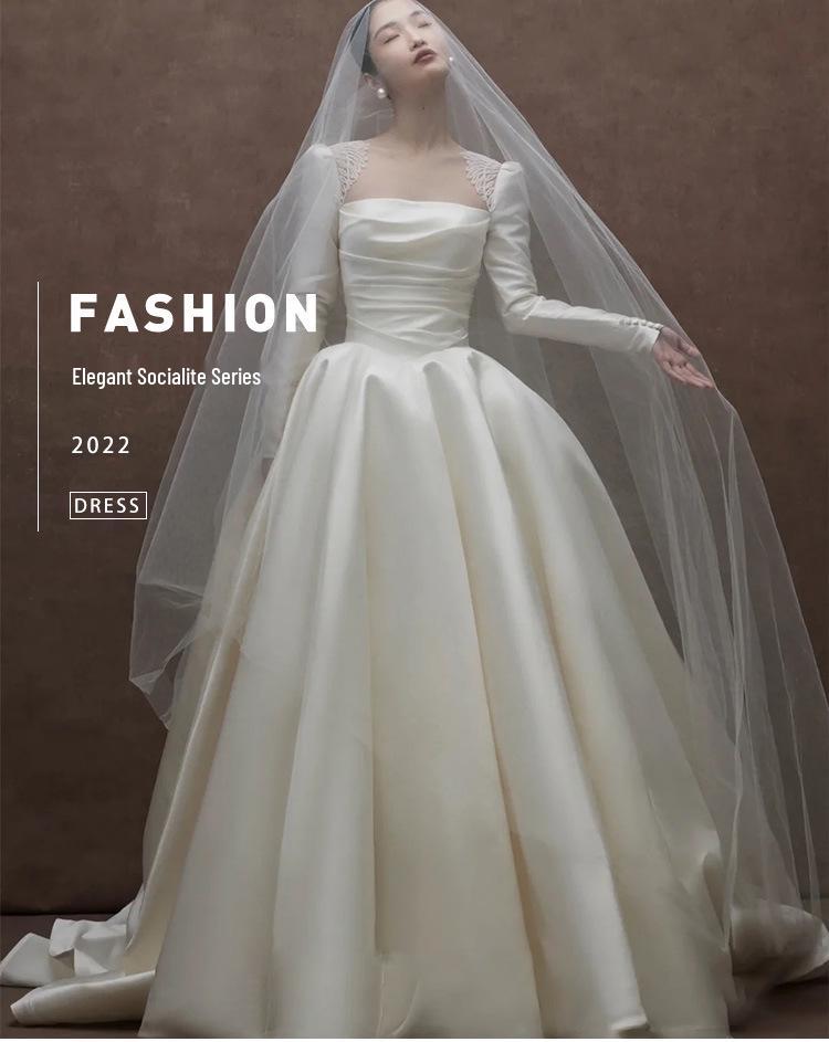 Elegant Backless Satin Wedding Gown - Vintage French-Inspired Long Sleeve Dress