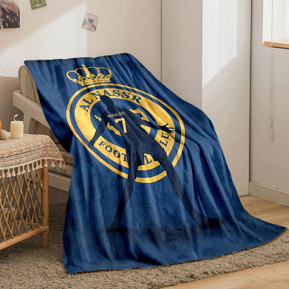 A Silhouette Stands Before a Golden Football Club Logo On a Blue Backdrop. for All Seasons Blanket Lunch Break Throw Gift