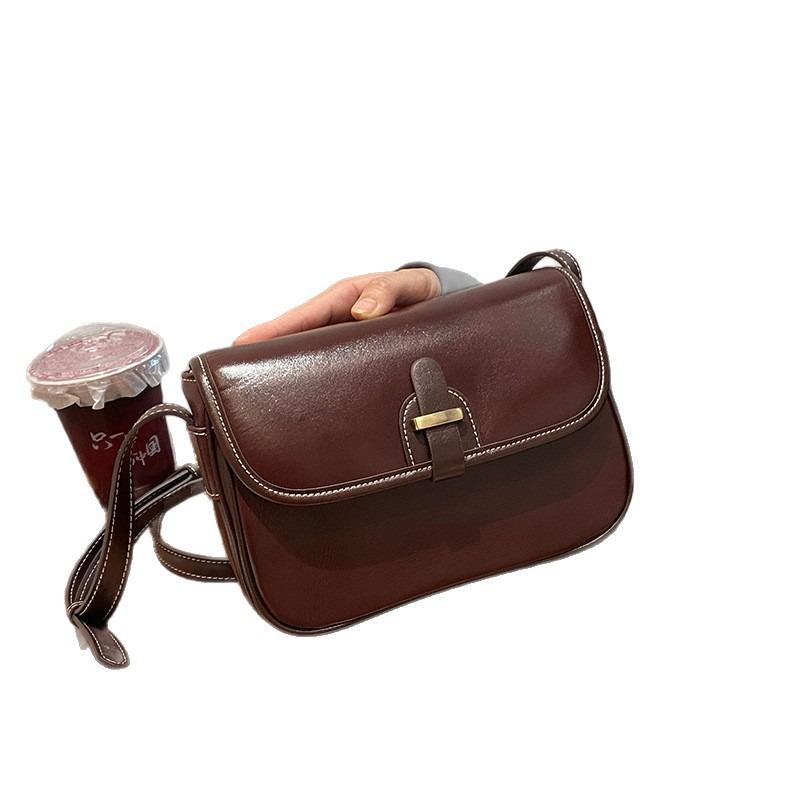 Leather women's bags, messenger bags, women's new cowhide small square bags, high-end texture and large-capacity commuter shoulder bags.