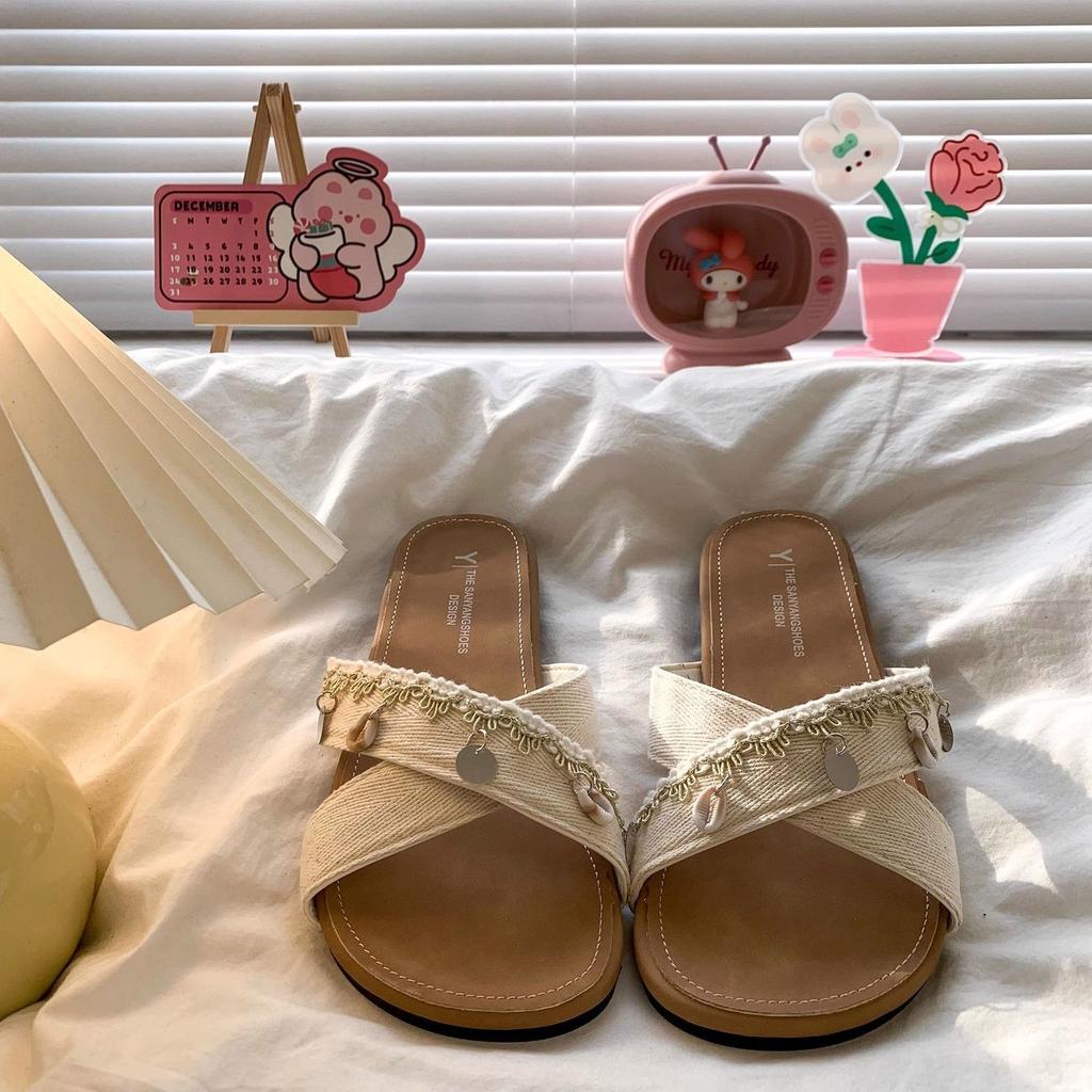 Seaside vacation wind one-word casual with skirt shoes 2025 new flat-bottomed cross with cool slippers women's summer wear