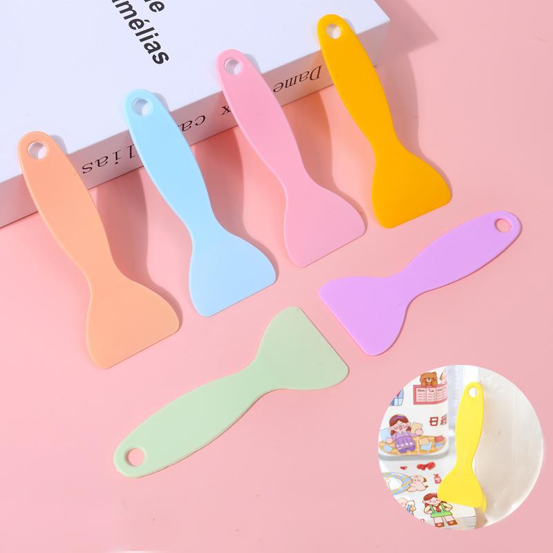 

Маленькая желтая лопатка Инструмент для наклеивания пленки на телефон - Пластиковый скребок Макарон с логотипом 8*3cm Small Macaron (9000 per box)