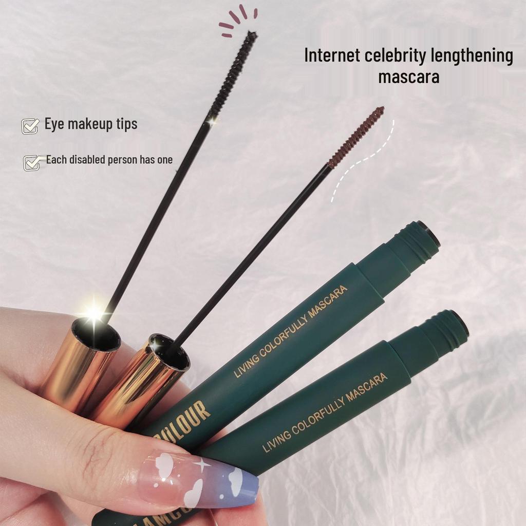 Magic Lash: Waterproof & Smudge-Proof Volumizing Mascara with Curling and Lengthening Small Brush Head.