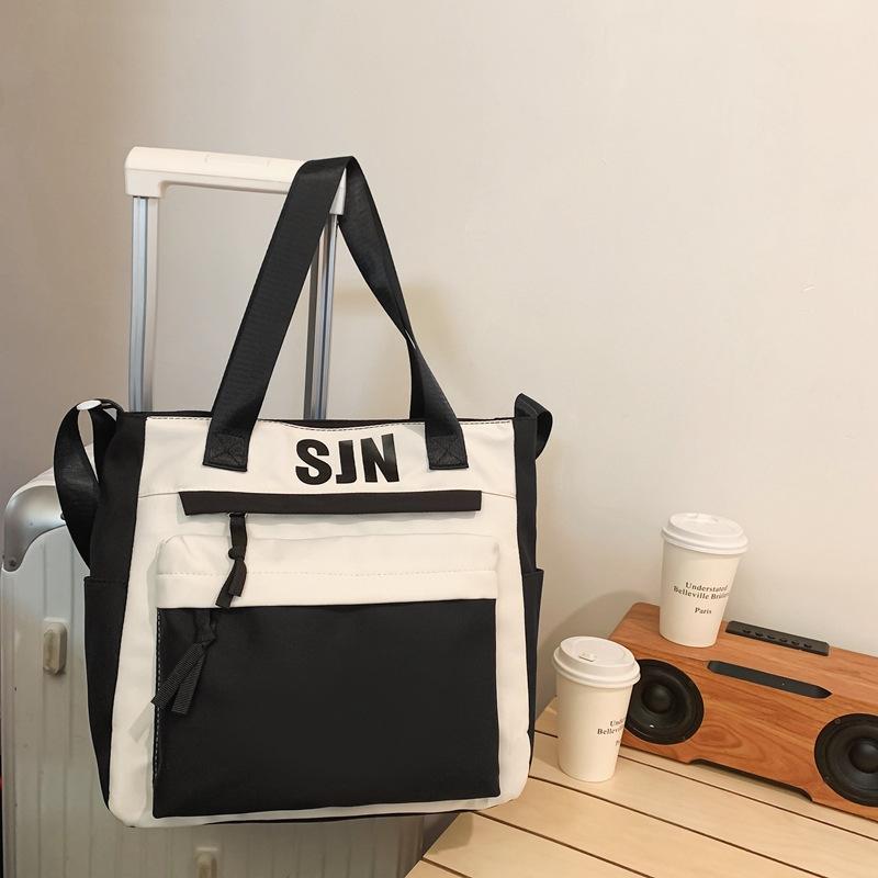 Schoolbag Japanese simple and fashionable backpack 1011 summer new middle school schoolbag college student college style alphabet backpack