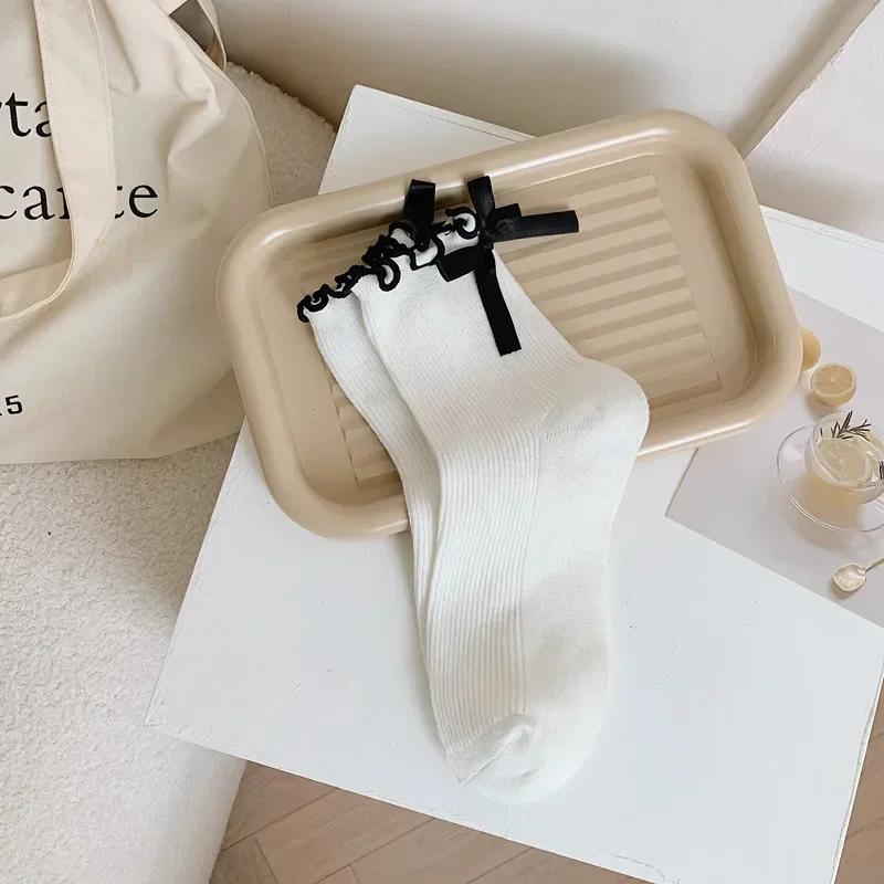Japanese JK Sweet Bowknot Tied Middle Tube Socks Women Heel Bow Casual Black White Pile Socks Girls Sports Cotton Socks