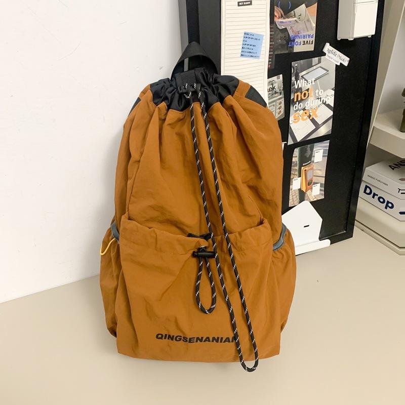 Solid color simple backpack, new drawstring outdoor, light sports and capacity, travel anti-splashing water-resistant wear-resistant and versatile