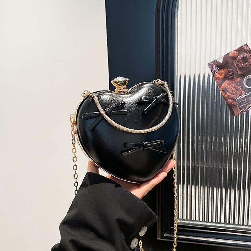 

Female Shoulder Bags Advanced Fashion Blue Heart Bow New Trend Sweet Lovely Leisure Trend Solid Color Chain Simple Crossbody Bag CLE 16x6x14cm чёрный