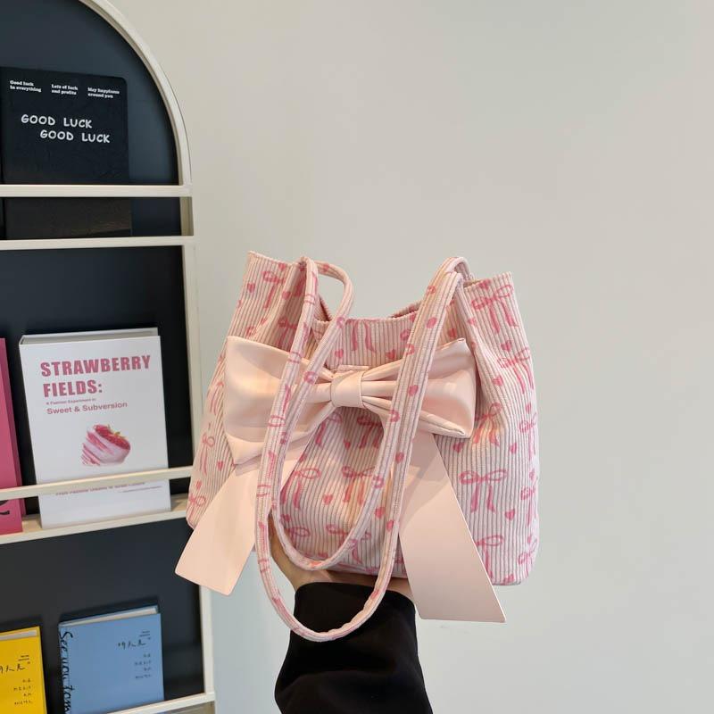 Korean new sweet and fashionable large-capacity bow canvas bag tote bag going out to commute to class shoulder bag women