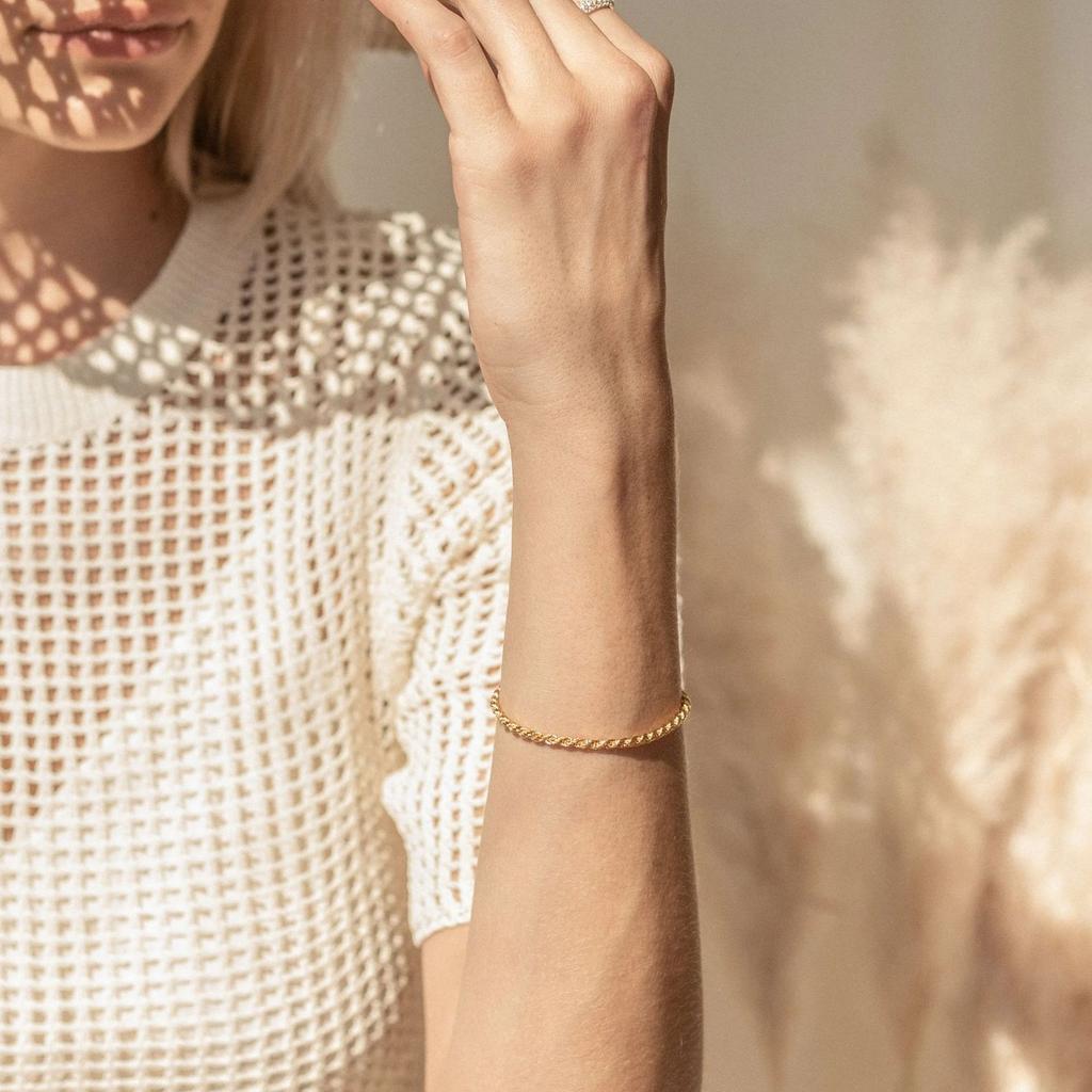 Popular simple twist chain bracelet, copper-plated 14K gold hip-hop niche design jewelry wholesale
