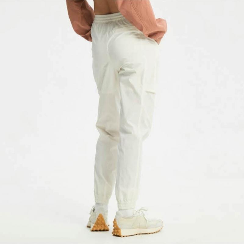 New Balance Pants Eqs Nbnte2w412 64 Women Nylon Stretch Jogger Pants