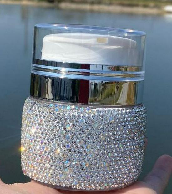 Rhinestone-Embellished Travel-Size Face & Eye Cream Bottles - High Aesthetic Design