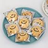 100pcs Cute Smiling Face Self-adhesive Bag Laser Transparent Biscuit Bag Cookie Packaging Bags Birthday Party Baby Shower
