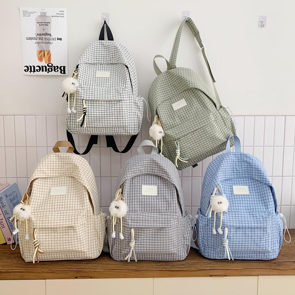 Schoolbag schoolbag female junior high school student high value plaid backpack autumn and winter new large capacity college student computer bag