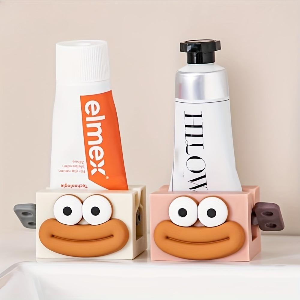 1/2 ks Ruční dávkovač zubní pasty s ovládáním jedním dotykem a roztomilým designem usměvavé tváře - Hygienický systém páky s jednosměrným tokem, Kompaktní