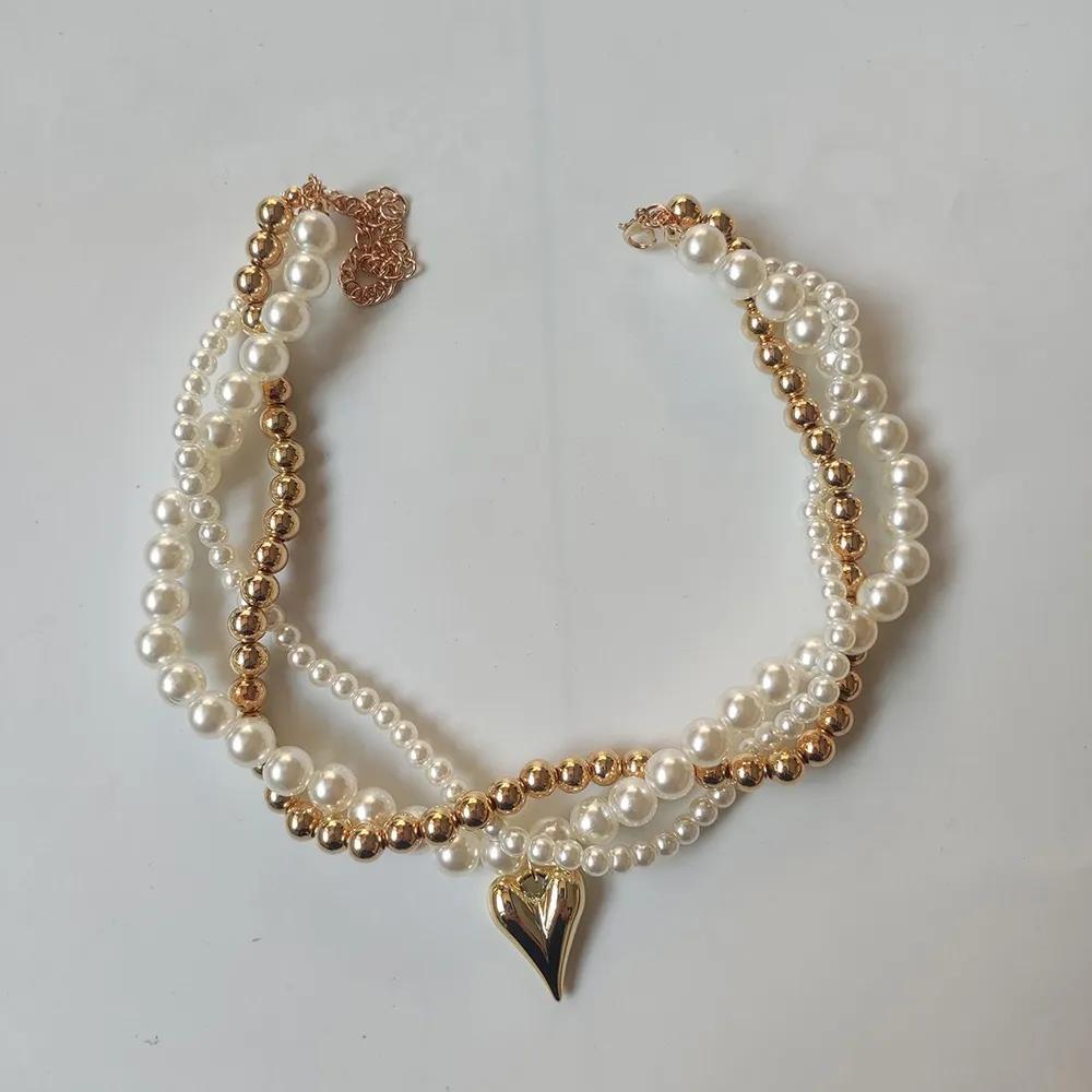 

Braided Beaded Necklace with Heart Pendant Faux Pearl Choker Multi-Strand Layered Chain Jewelry for Women and Girls One Size