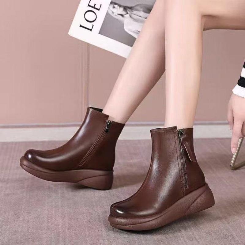 Thick-soled muffin short boots women's autumn and winter new soft leather round head flat bottom velvet warm casual temperament Martin boots