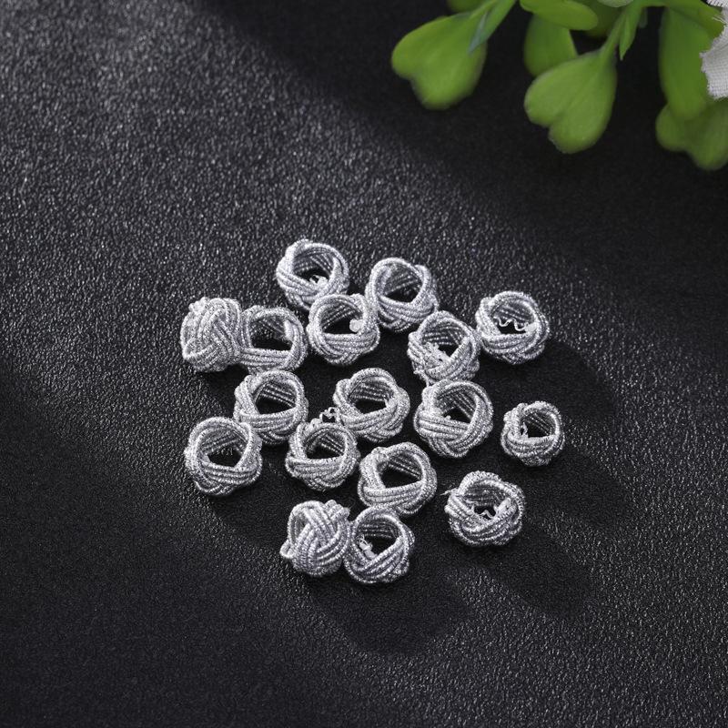 Exquisite Gold Ring with Wire Coil, Gold & Silver Buckle, and Woven Knot Ball