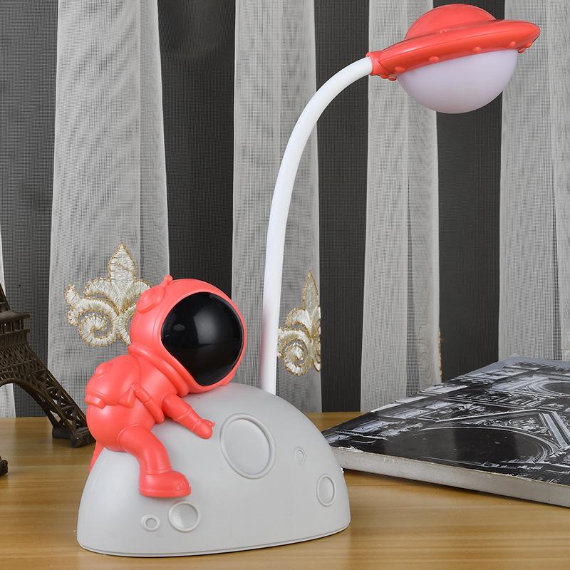 Astronaut LED Night Light: Moon Man Bedside Lamp for Student Dorms, Reading, and Desk Atmosphere.
