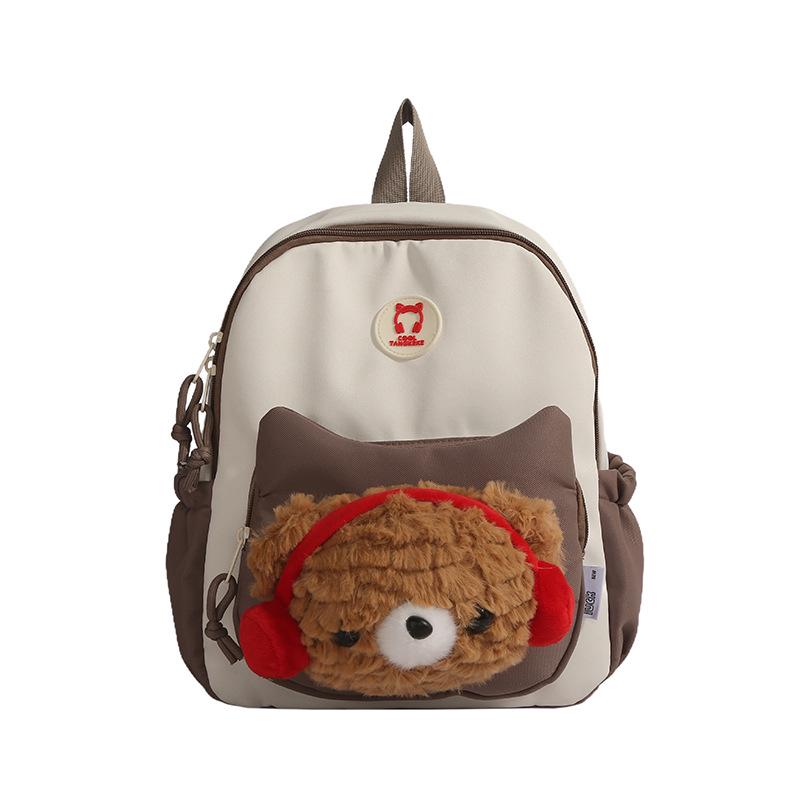 Cute Cartoon Trendy Backpack: Large Capacity, Lightweight, Versatile Travel/School Bag with Earphone and Doll Holder.
