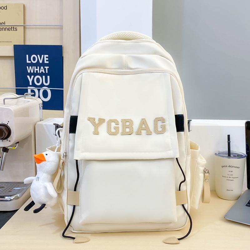 

Primary and secondary school students backpack large capacity fashion letter nylon backpack leisure trend class bag single package