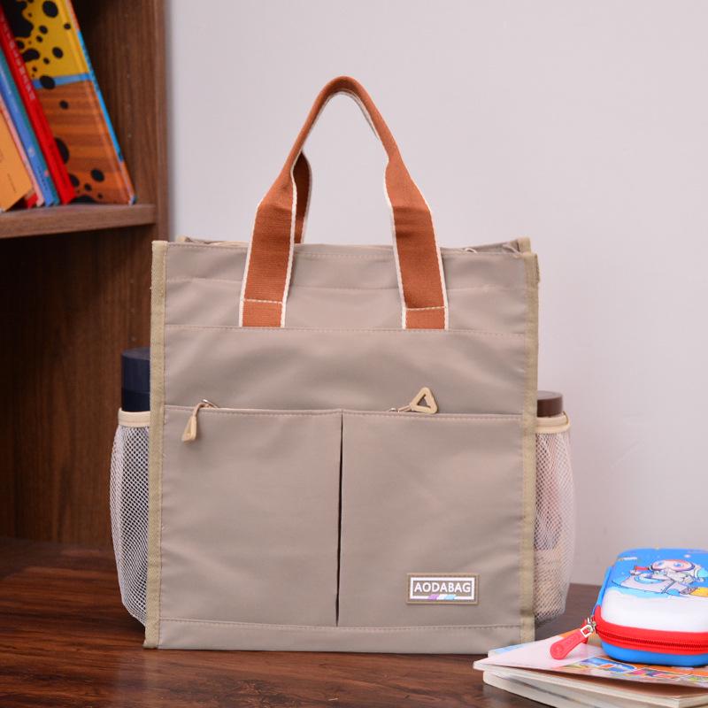 

Waterproof Oxford School Tote Bag for Students - Large Capacity Book Carrier for Elementary to Junior High Boys хакі
