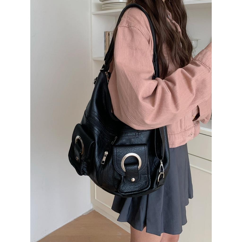 Koreanische Version Schlichte Persönlichkeit Vielseitig Modisch Reißverschlusstasche PU-Leder Tragetasche Schultertasche Pendeln Große Kapazität Rucksack