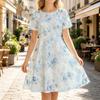 Abito estivo svasato da pattinatrice per donna, girocollo a maniche corte, motivo floreale azzurro chiaro, abito casual al ginocchio per l'uso quotidiano