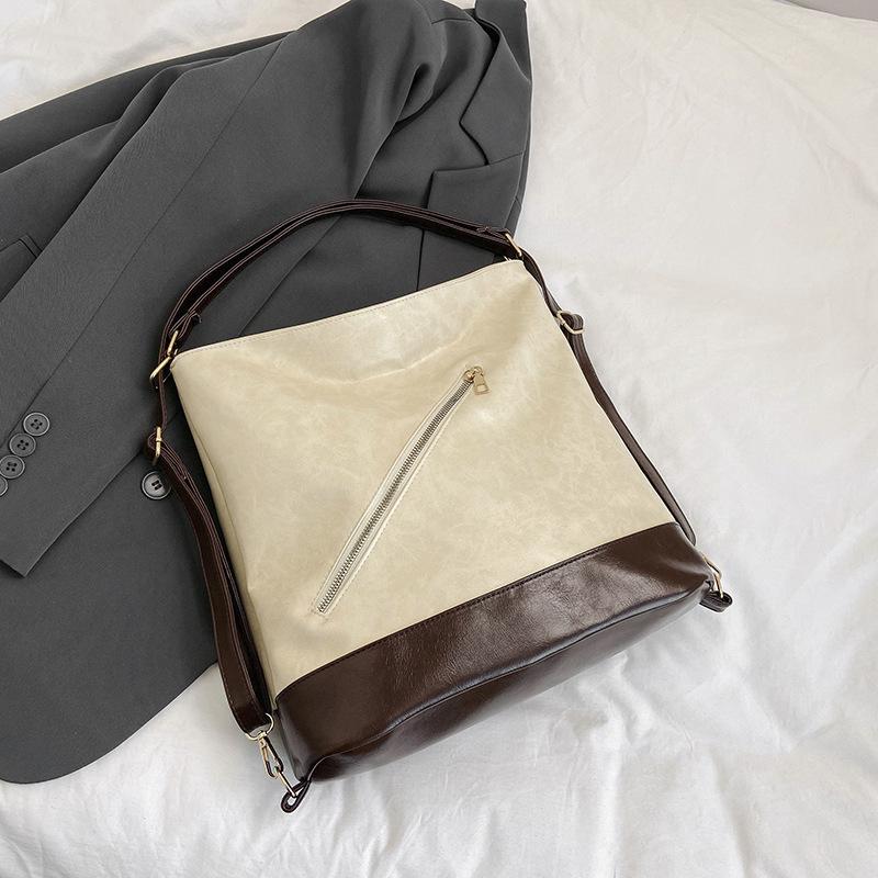 

Нишевый дизайн, сумка-тоут большой вместимости под мышкой, женская, ранняя весна 2025, новая модная сумка-тоут на двойном плече, тренд покинуть белый