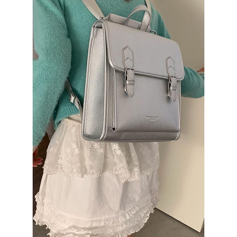 

Korean version of simple backpack bag women s 2025 new college style backpack large capacity multi-functional shoulder messenger bag серебряный