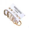 Hot-selling butterfly pearl love earrings women's creative retro alloy earrings set pair