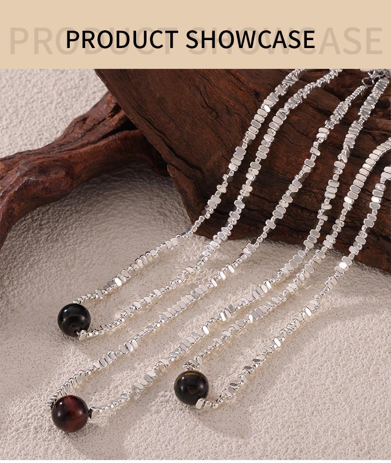 Minimalistyczny koreański naszyjnik z zawieszką z tygrysiego oka z łączonym srebrem próby 925 i designem ze stali tytanowej