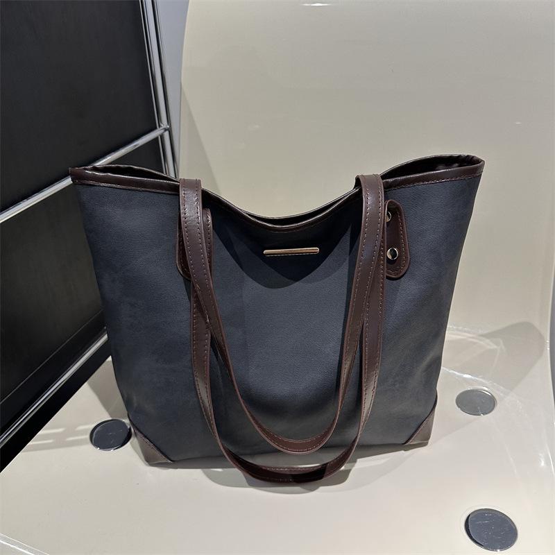 

Корейська версія великої місткості жіночої весняної нової осінньо-зимової модної сумки-тоут, простої сумки через плече чорний