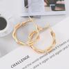 Trendy Geometric Twist Hoop Earrings: Stylish Metal Accessories for Women
