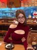 Elegant Hollowed-Out Off-Shoulder Women's Winter Top: High-End, Sexy, Long-Sleeved Outerwear for Fashion-Forward Socialites.