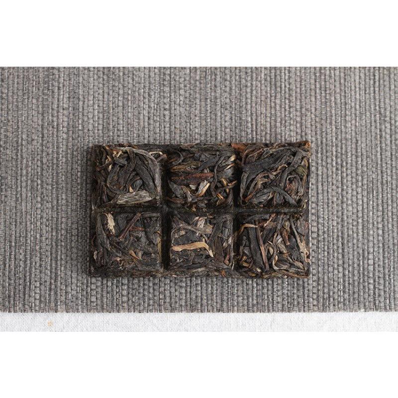 50g Yunnan Pu'er Tee Xigui Prince Großer Alter Baum Pu'er Roher Tee Ziegelgealterter Pu'er