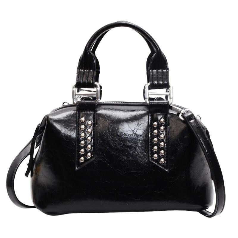 Today's popular women's bags, new simple rivets, large-capacity hand-held versatile shoulder pillow bag
