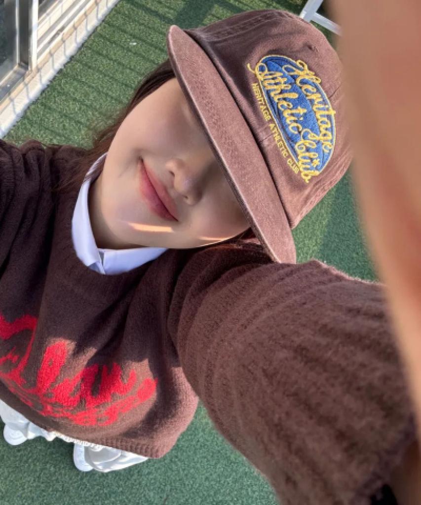 Yunibeoseugameonteu Universe Sign Long Bill Washed Cap_Brown