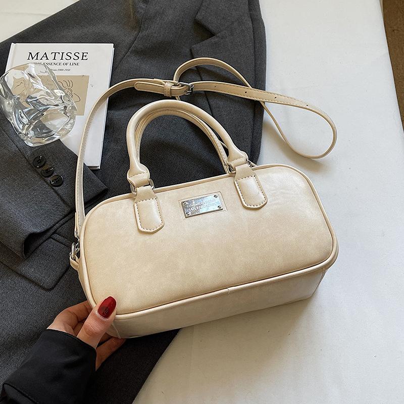 2025 new Korean version fashion simple commuter gloves bowling bag commuter versatile niche trend messenger women's bag