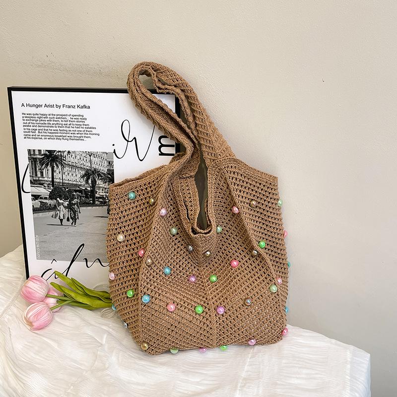 Large capacity tote bag women's seaside vacation weaving lazy literary leisure commuting leisure design shoulder armpit bag