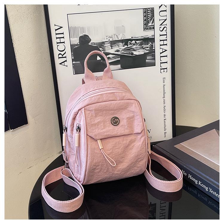 Schoolbag custom logo new niche design backpack women's simple versatile large capacity casual high value backpack